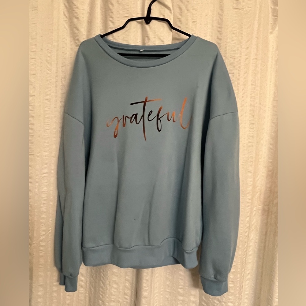Light blue sweater size L